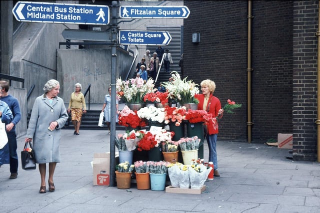 Flower seller at junction of Flat Street and Pond Street, c. 1960