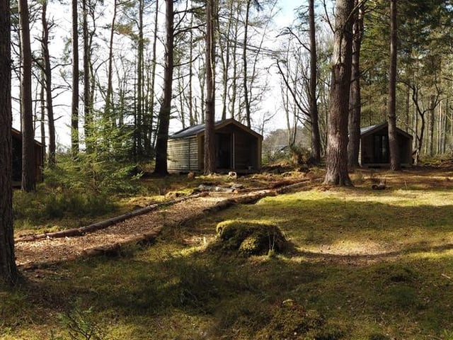 Off-grid camping meets kid-friendly adventure at this retreat where activities including axe throwing, bushcraft and paintballing.