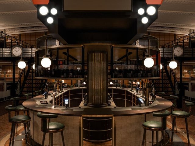 There is a life sized subway carriage above the bar, which contains a DJ booth.