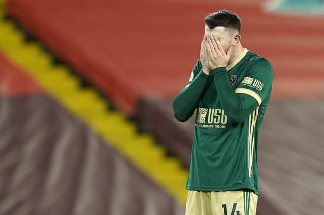 Sheffield United's Oliver Burke looks dejected after a missed chance: Andrew Yates/Sportimage