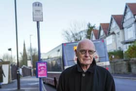 Dr Mark Doel at the bus stop on Cemetery Road where the shelter has been removed. Picture Scott Merrylees