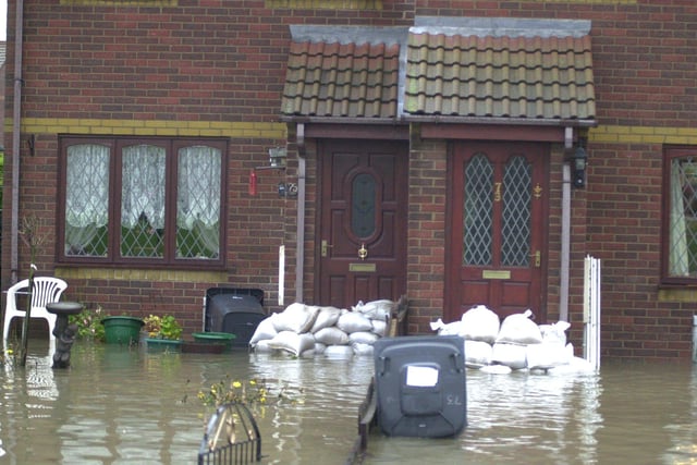 Catcliffe floods where sandbags were outside homes in November 2000