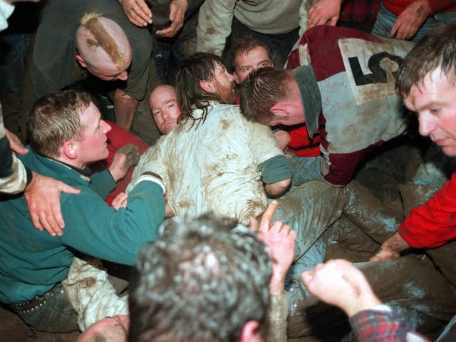 Oose agen hoose, toon agen toon, if a man meets a man, knock '˜im doon, but don't '’ot ‘im,' which translates as '˜house against house, town against town, if a man meets a man, knock him down but don't hurt him words to live by in 1999
