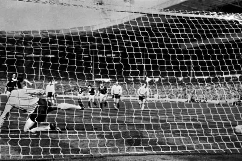 Jim Baxter beats Gordon Banks from the penalty spot to score his and Scotland's second