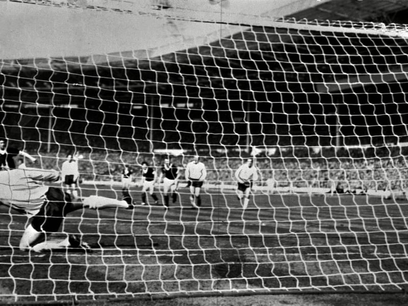 Jim Baxter beats Gordon Banks from the penalty spot to score his and Scotland's second