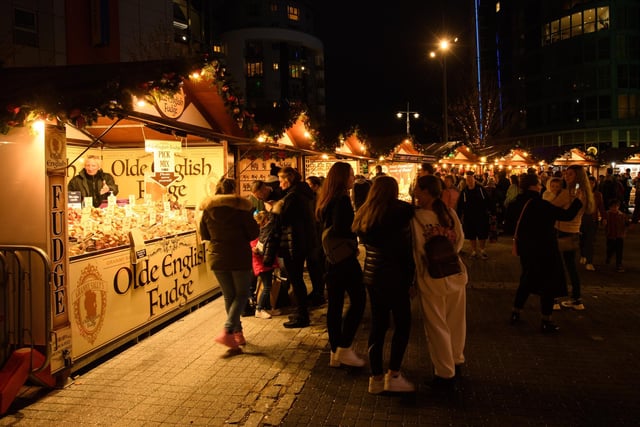 Here is what a trip to Gunwharf Quays' Christmas village looks like. This stall is selling 'Olde English fudge'. Picture: Keith Woodland (131121-48)