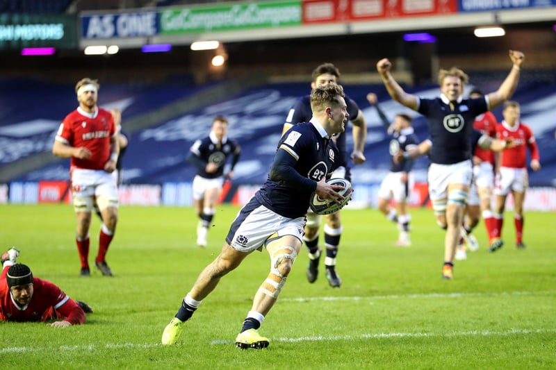 Scotland's Darcy Graham runs in to score his sides first try during the Guinness Six Nations match at BT Murrayfield Stadium, Edinburgh