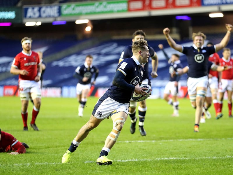 Scotland's Darcy Graham runs in to score his sides first try during the Guinness Six Nations match at BT Murrayfield Stadium, Edinburgh