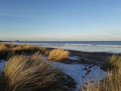 Belhaven Bay is an extensive beach within the John Muir Country Park, adjacent to Dunbar. The beach is ideal for walking, having picnics and sunbathing and affords splendid views out to open sea with the open water being extremely popular for surfing