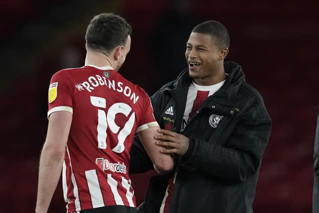 Sheffield United striker Rhian Brewster with Jack Robinson, who was also on target during the win over Luton Town: Andrew Yates / Sportimage