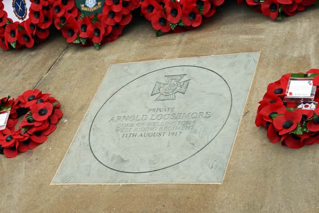 A commemorative plaque to Arnold Loosemore VC at the war memorial in Barkers Pool, Sheffield,. Arnold is listed on the 1921 census of Sheffield