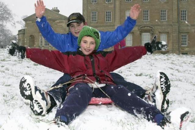Sprotbrough boys Adam and Tom Kaye, aged ten and 12. Sledging down Cusworth Hall's hill in 2000.