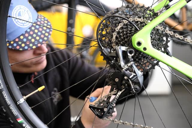 Workshop manager Karlos Bingham gets a bike back on the road again at A Different Gear, Sheffield