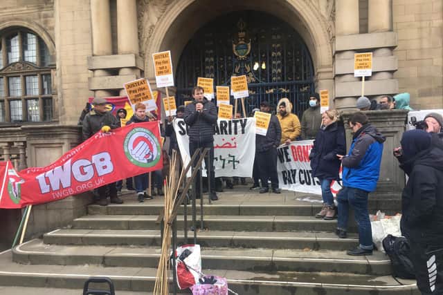 Protesters outside the Town Hall today.