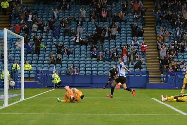 Sheffield Wednesday striker Lee Gregory scores the winner against Bolton Wanderers.  Pic Steve Ellis.