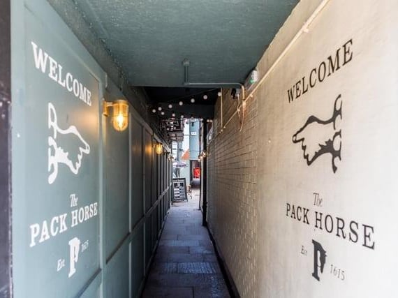 A pub on the site first opened in 1615 as The Nag’s Head, although it may have been the site of a drinking house since the 1130s. It became The Pack Horse after a major 1982 renovation.