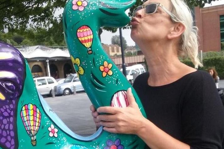 Jane Norburn gets affectionate with the elephant she designed!