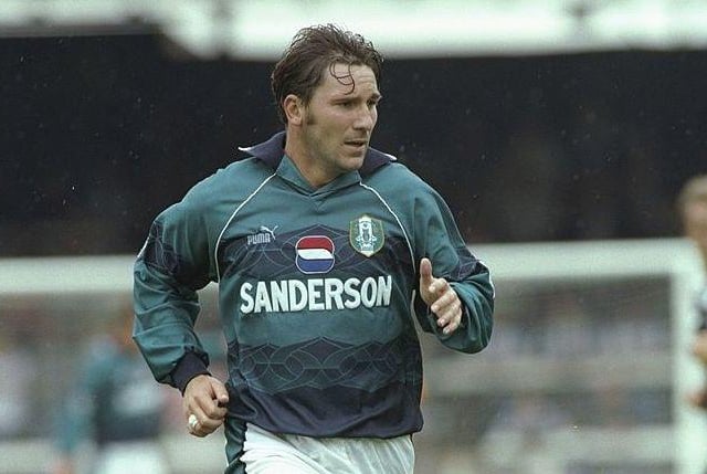 I think this could've been the first non-blue and white Wednesday shirt I ever got. From an era when football shirts had some uniqueness to them. I always think of David Hirst when I see this shirt. Beautiful. (Allsport UK)