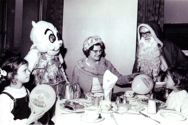 Gloops had breakfast in Cockaynes Restaurant with Father Christmas and young shoppers in the store - picture shows 7 year old twins Nicholas and Caroline Bush of Lodge Moor with their grandmother Nettie Curtis in December 1972