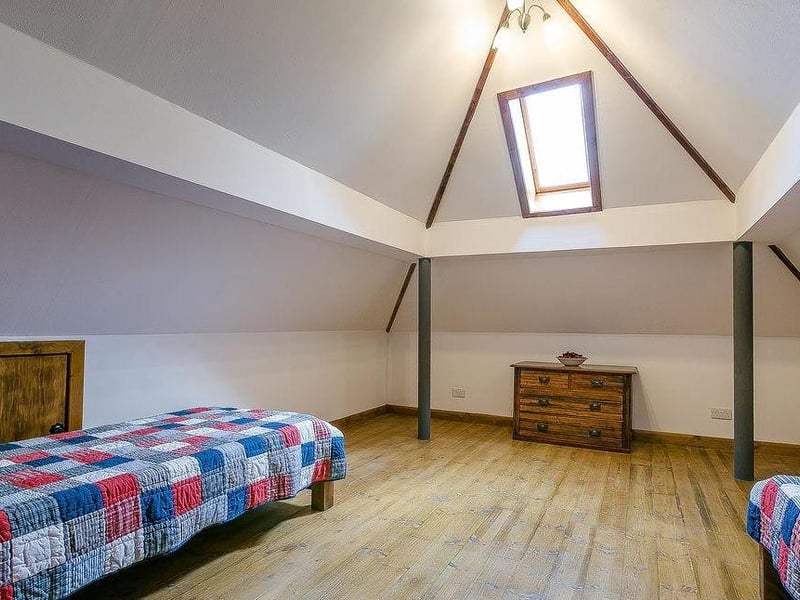 The second bedroom at Woodmans Cottage. Functional but cosy.