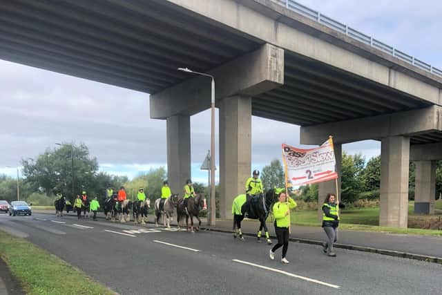 13 riders rode through Dronfield to raise awareness for how to safely pass horses on the road