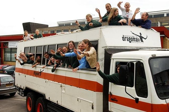 Pupils from City School with the overland truck they will use on a trip to South Africa, on June 29, 2004