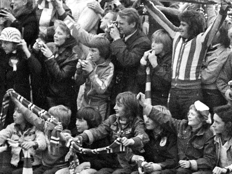 Now that's some vantage point! Tell us if you were pictured on the roof of the Board Inn in 1973.