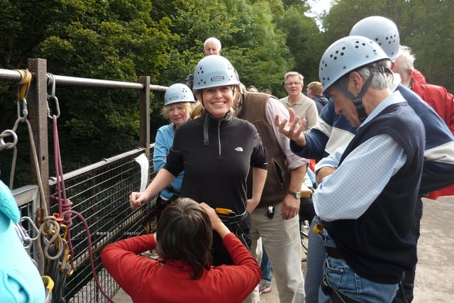 Volunteers, including MEP Emma McClarkin, abseiled 80 feet from the bridge at Millers Dale in 2011