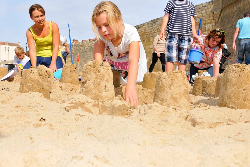 The annual Headland Carnival held its sandcastle building competition on the Fish Sands in 2014. Can you spot someone you know?