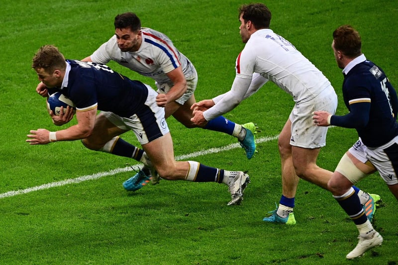 Scotland's Duhan van der Merwe scores the winning try at the end of the Six Nations rugby union tournament match between France and Scotland on March 26, 2021, at the Stade de France in Saint-Denis, outside Paris. (Photo by Martin Bureau/AFP via Getty Images)