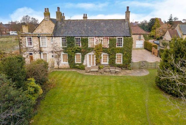 This five bedroom Grade II listed has five reception rooms and has been recently renovated. Marketed by Open Door, 01777 717166.