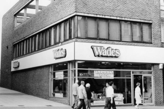 The window advert promises unbeatable prices at Wades. What are your memories of shopping there in the mid 1980s?