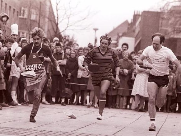 Pancake day races in Wakefield precinct in February 1985