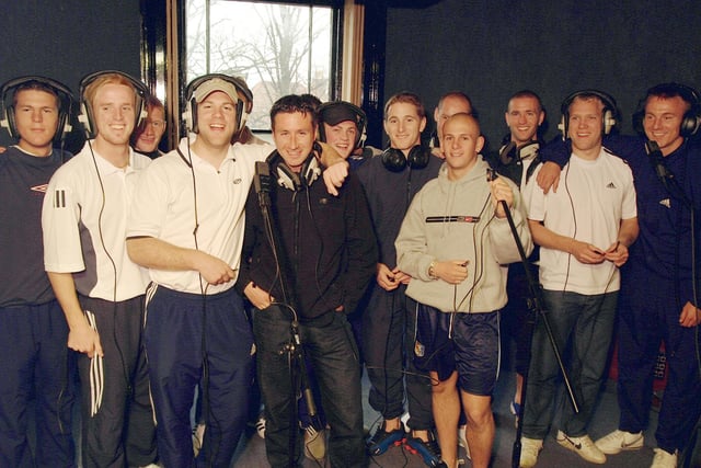Mansfield Town's players in the recording studio as they marked promotion with a record.
