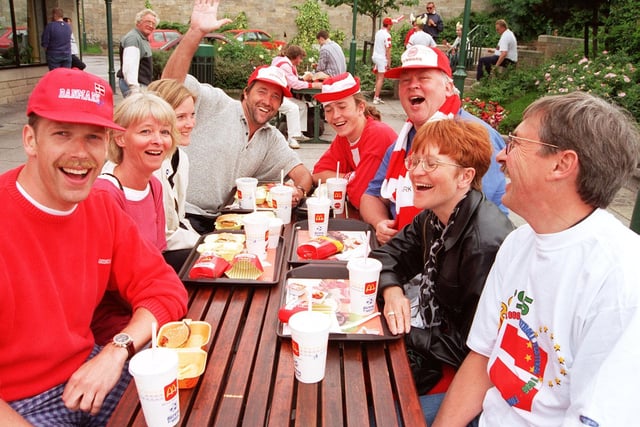 Danish families enjoy a McDonald's on Penistone Road ahead of kick-off at Hillsborough.