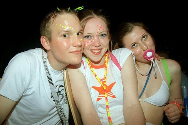 From left - Pete, Lou and Sara at 'Gatecrasher' - a night held monthly at the Republic nightclub in the city centre, May 19, 2003