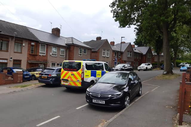 Residents on a Sheffield road where street violence broke out twice in a week have called for calm – and an end to mob rule. The picture shows a police van patolling the road on Thursday
