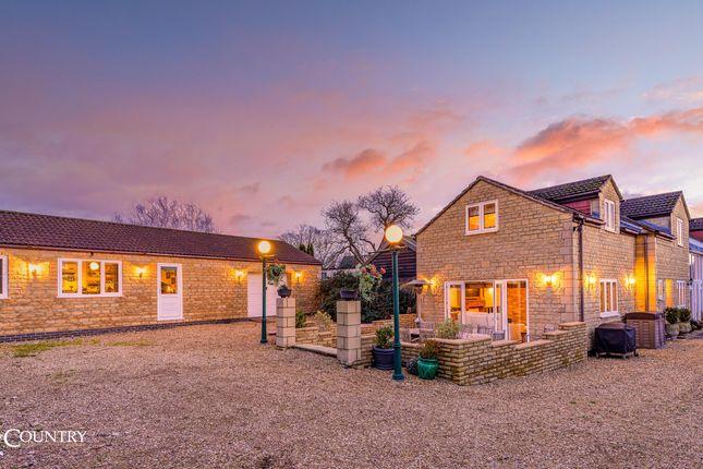 This beautiful property offers a cosy yet contemporary feel and stands on a large plot of almost an acre.