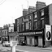 Ecclesall Road at the junction with Hanover Street in 1965, showing adverts for Guinness and Kellogg's Corn Flakes