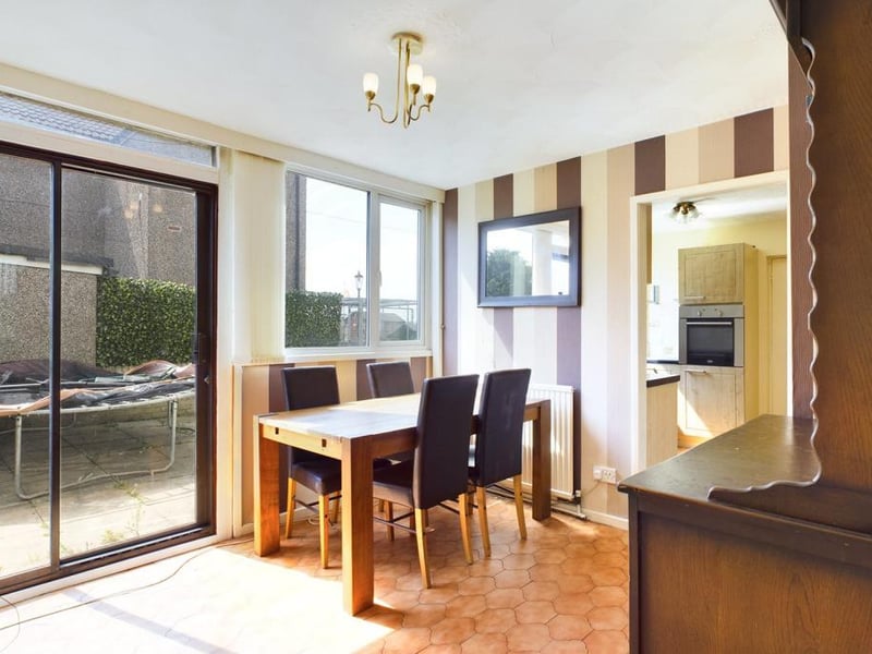 Dining room with patio doors opening on to the garden