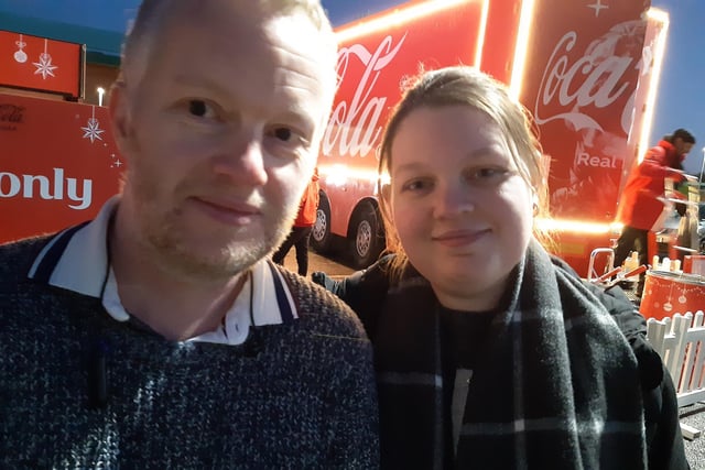 Hundreds of families headed for the bright red Coca Cola Truck as it finally arrived at Meadowhall this evening. Ian Morton and Zoe Ward