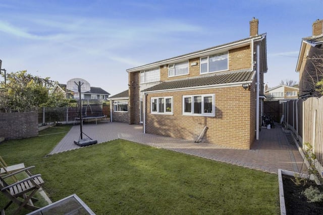 Rear garden - To the rear of the property is an enclosed garden with large block paved patio area, lawn and play area. There is a further raised patio area which is ideal for entertaining. The garden extends to the side with mature shrubs and plants.