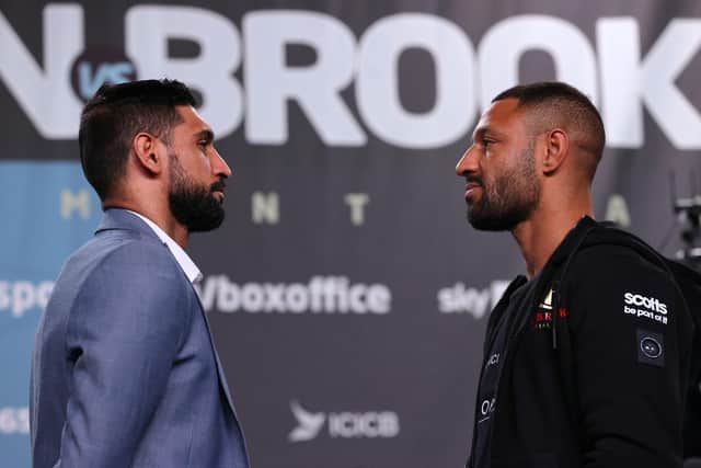 MANCHESTER, ENGLAND - FEBRUARY 17:   Amir Khan and Kell Brook go head to head after a BOXXER press conference ahead of their fight at Manchester Central Convention Complex on February 17, 2022 in Manchester, England. (Photo by Alex Livesey/Getty Images)