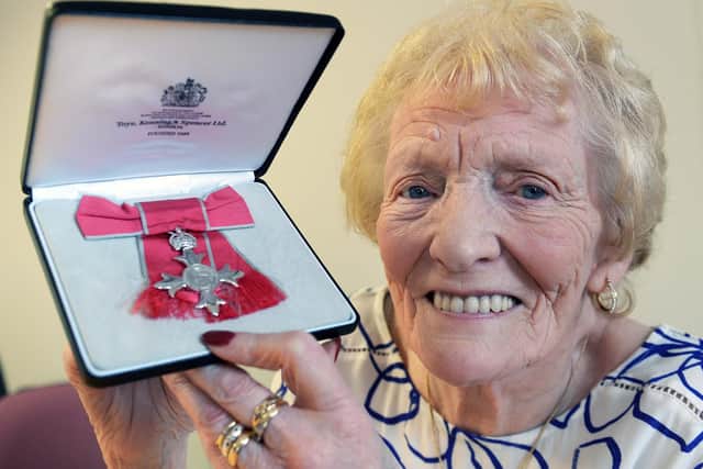 Anne Shaw is retiring as a Foster Carer after more than 40 years. Pictured is Anne with her MBE.