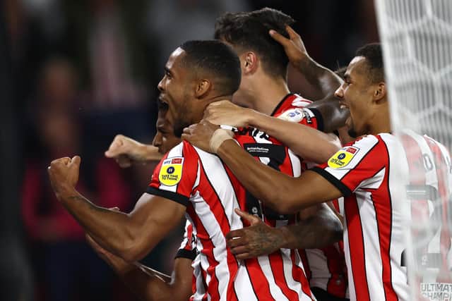 Max Lowe celebrates after opening his Sheffield United account Darren Staples / Sportimage