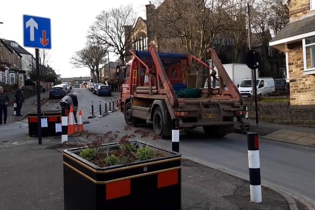 Barriers put in place yesterday as part of a controversial Sheffield ‘active travel’ scheme are to be removed. PIcture shows a skip lorry unable to pass a box van at the junction on Springvale Road,  Crookes after the barriers were put in place
