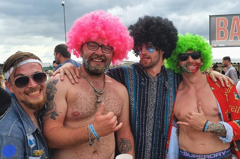 Friends from Guildford and Scotland wearing wigs for the crack. Picture: Vernon Nash