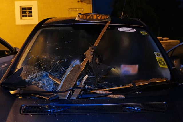 Debris smashed a taxi windscreen that was parked not far from the sight of the explosion.