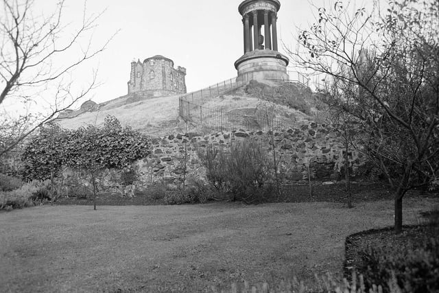 A view from the Rock House, on Calton Hill, owned by Mr and Mrs E Hall, showing Dugald Stewart's Monument and the Observatory buildings, in October 1959.