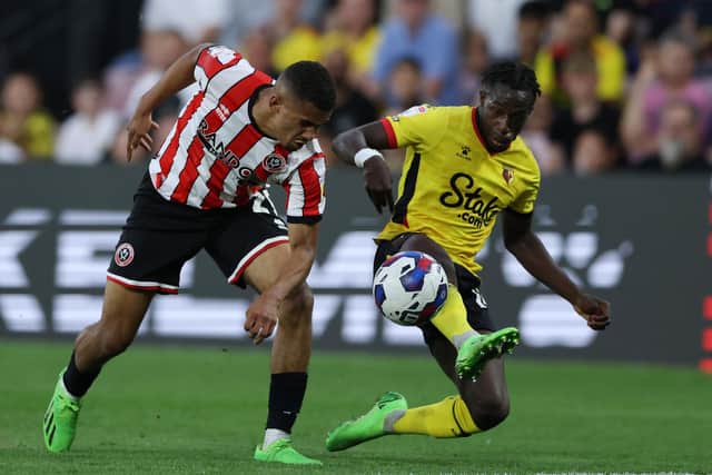 lliman Ndiaye of Sheffield United is challenged by Hassane Kamara of Watford: Jonathan Moscrop / Sportimage